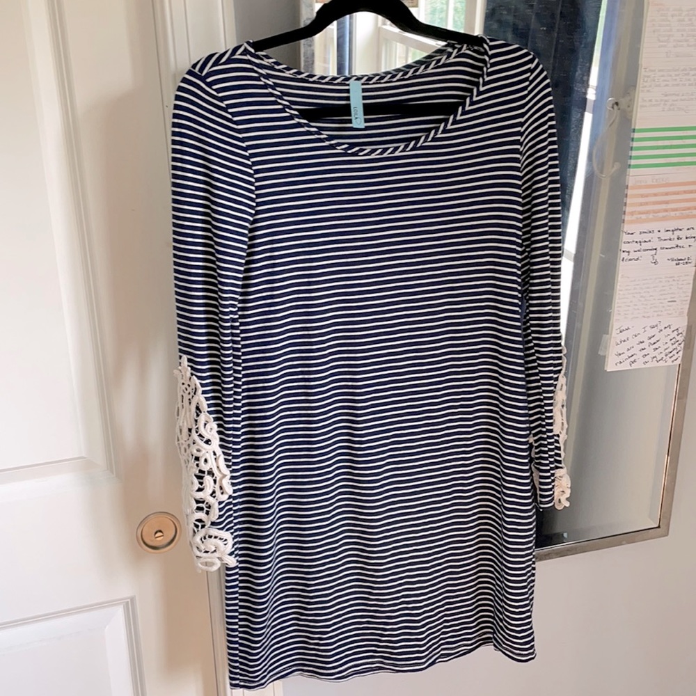 Blue and white striped dress with lace sleeves